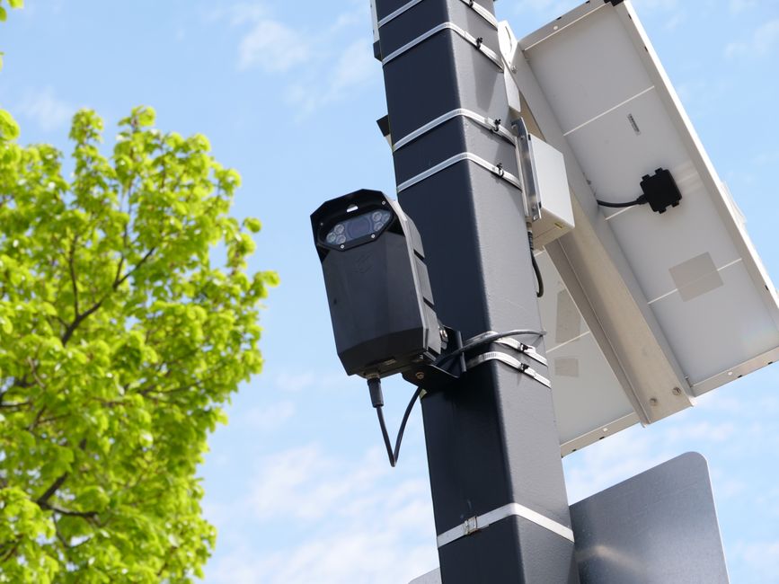 FIREBird AI wildfire detection device mounted on a pole above California foothills