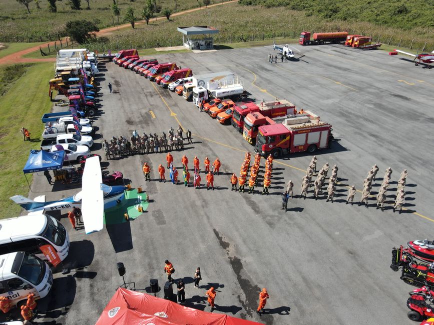 Aerial shot of fire trucks and personnel in a coordinated deployment