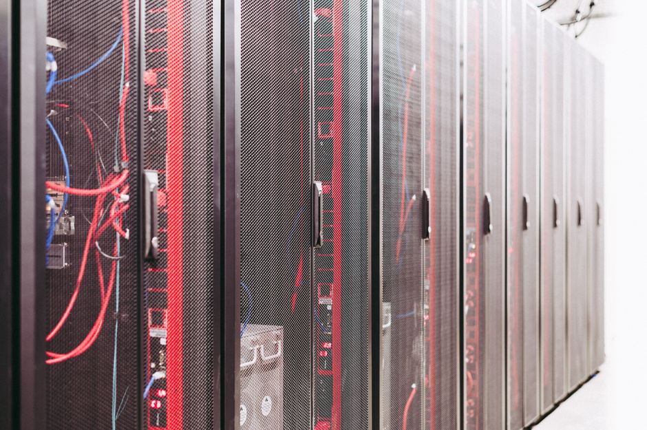 Server racks with network cabling in a modern data center