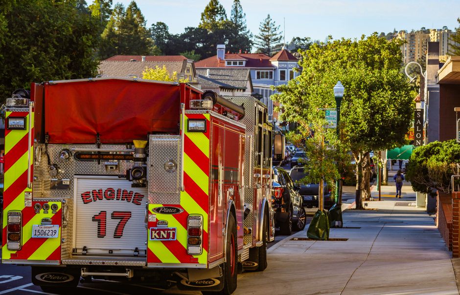 American fire engine on a tree-lined residential street